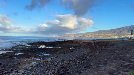 Tenerife-South-rocky-coast-at-sea-in-afternoon-landscape-near-Playa-de-las-Americas,-Canary-Islands