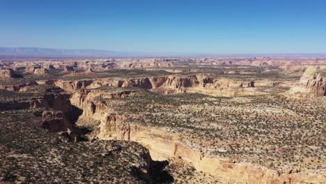 Aerial-view-flying-over-canyons-and-gullies-near-Chimney-Rock-viewing-area-near-I70-in-Utah