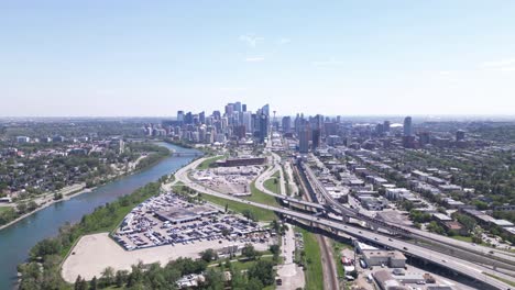 A-drone-flies-towards-Calgary's-downtown-overtop-of-2-major-corridors-bringing-traffic-in-and-out-of-downtown