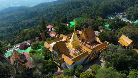 Wat-Phra-That-Doi-Suthep-Stupa-Chiang-Mai-Tourist-Attraction-Mountain-Jungle-Lanna-Kingdom-Temple,-Doi-Suthep-Doi-Pui-Aerial-Birds-Eye-View-Flyover