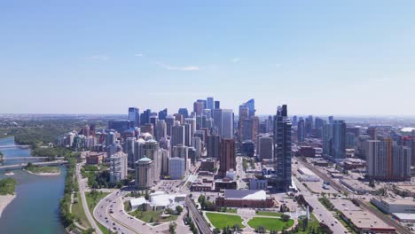 Calgary's-downtown-and-Bow-River-are-seen-from-a-aerial-drone-on-a-summer-day