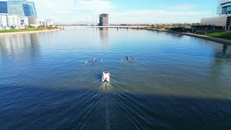 Rowing-crew-practicing-on-Tempe-Town-Lake-located-in-Tempe-Arizona-just-outside-of-Phoenix