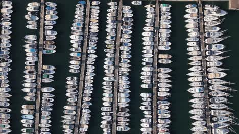 Top-Down-Aerial-View,-Sailboats-and-Yachts-in-Marina-by-Mediterranean-Sea,-Marseille,-France