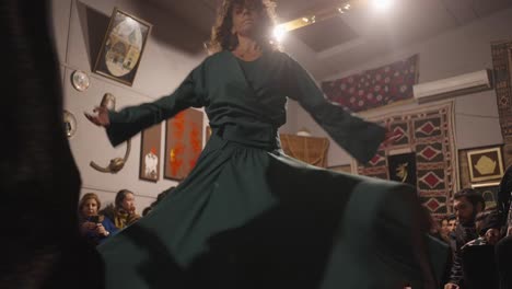 Sufi-Whirling-Dervishes-Dance-performed-by-western-white-woman-In-Konya,-Turkey