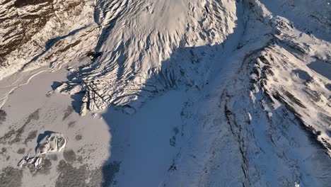 Aerial-view-over-Sólheimajökull-glacier-ice-melting,-climate-change,-Iceland-at-dusk