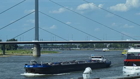 Vessel-carries-cargo-along-the-waterways-of-Dusseldorf-delivery-goods