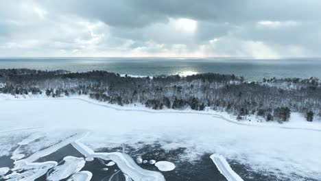 Lake-Michigan's-waters-in-the-distance-from-above-an-inland-lake