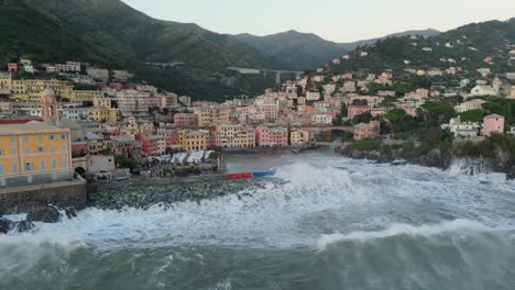 Forceful-sea-waves-breaking-on-harbor-pier-on-shore-of-Genoa-city