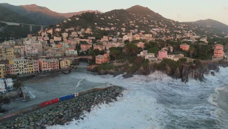 Massive-waves-crashing-on-shore-of-Genoa-city-harbor-with-pier-breaker