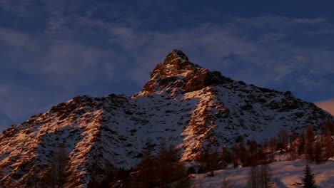 Low-angle-of-snow-covered-mountain-peak-in-winter-season,-Valmalenco-in-Italy