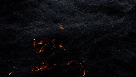 ARTISTIC-FIRE-TRAILS:-Sparks-of-heat-rising-up-from-the-bottom,-then-spreading-to-the-left-and-right-through-an-abstract-moody-web-of-darkness