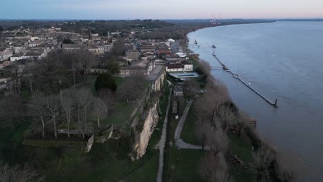 Twilight-Over-Historical-Bourg-sur-Gironde,-France---aerial-fly-over