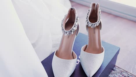 Top-view-of-a-glamorous-wedding-bridal-high-heel-shoes