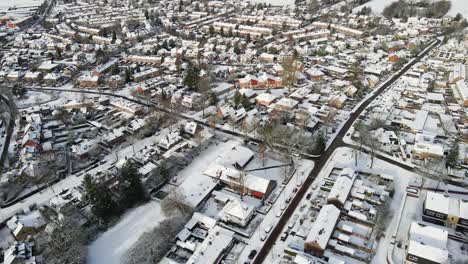 Beautiful-aerial-of-rustic-town-covered-in-snow