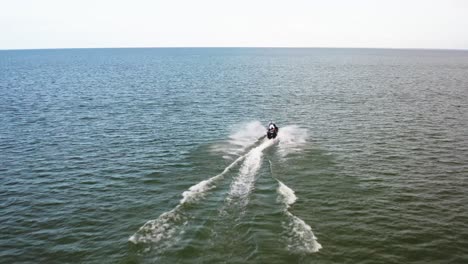Nimble-jet-ski-slices-through-the-water-with-exhilarating-speed
