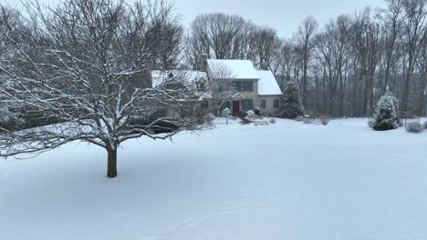 Aerial-establishing-shot-of-American-house-in-winter