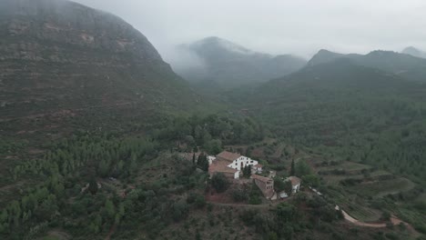 Beautiful-farmhouse-in-middle-of-misty-mountains-near-Montserrat,-Catalonia