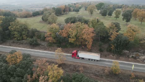 Semi-trailer-transports-material-on-a-foggy-day-on-the-highway-near-Perafita