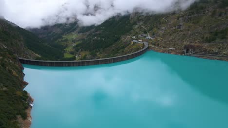 Drone-shot-flying-around-the-Place-Moulin-dam-in-the-province-of-Aosta-in-Italy