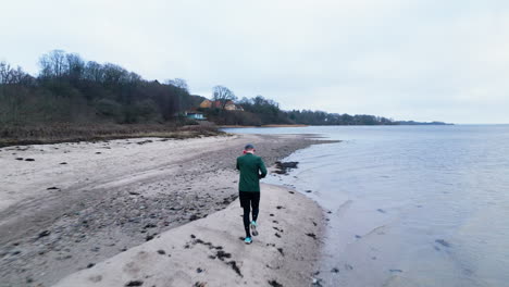 Solitary-jog-along-the-winter-beach