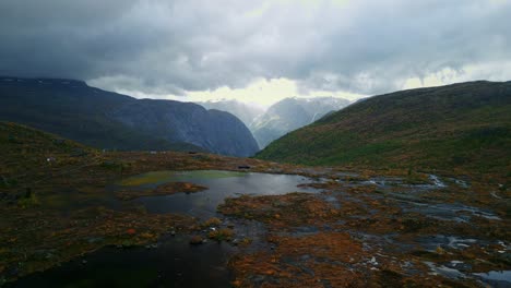 Drone-flies-over-the-high-plateaus-of-Norway-with-a-view-of-Lake-Troll-after-severe-storms