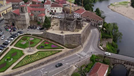 Barcelos's-medieval-castle-and-garden-aerial-view,-Portugal---aerial