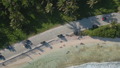 Aerial-View-of-Tourist-Golf-Carts-Next-to-the-Beach