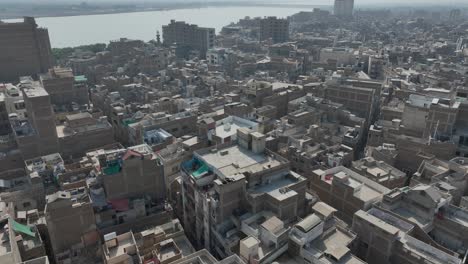 Dense-urban-fabric-of-Sukkur,-Sindh,-Pakistan---aerial