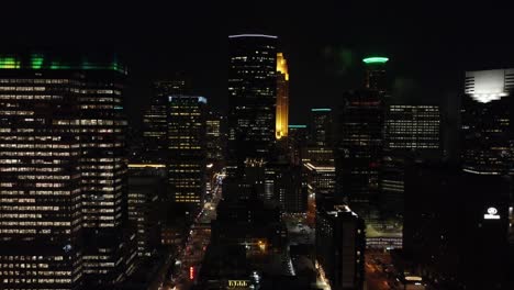 Drone-through-Downtown-Minneapolis-on-a-foggy-night-4k