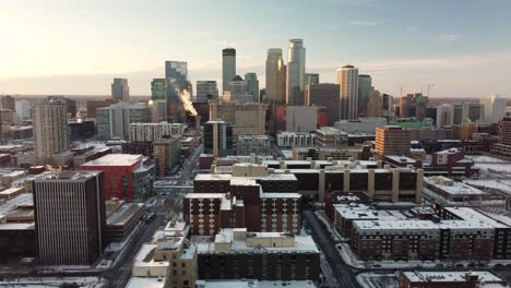 Drone-push-in-of-downtown-Minneapolis-from-the-East-during-Winter-sunset-4k