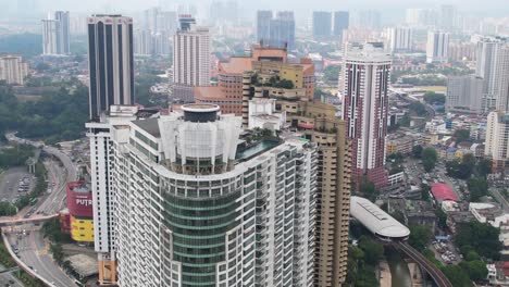 Regalia-Residence-Apartments-Rooftop-Exterior-in-Chow-Kit-District-of-Kuala-Lumpur,-Malaysia---Aerial-parallax
