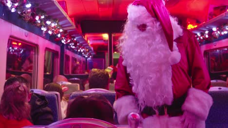 Actor-playing-Santa-Claus-entertains-passengers-on-Polar-Express-train