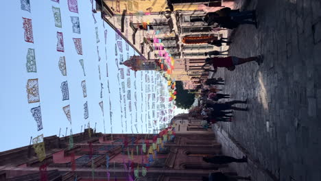 Street-with-tourists-walking-at-San-Miguel-de-Allende-in-the-day-of-the-dead-celebration