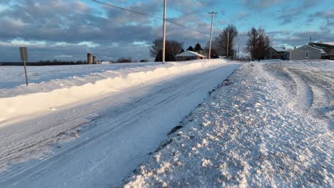 Winter-snow-drifts-along-rural-country-road