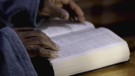 praying-to-God-with-bible-faithfully-worshipping-with-people-stock-footage-stock-video