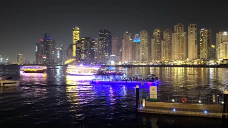 Night-view-of-Blue-waters-island,-new-walking-area-with-shopping-mall-and-restaurants,-Dubai,-UAE,-25