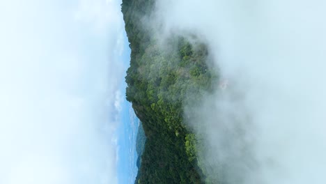 Mountain-Viewpoint-nestled-in-Clouds,-Doi-Pui-Viewpoint-Doi-Suthep-National-Park-Chiang-Mai,-Lush-Green-Rainy-Season-Weather-Forest,-Portrait-Vertical-4k-9:16-Video-Social-Media