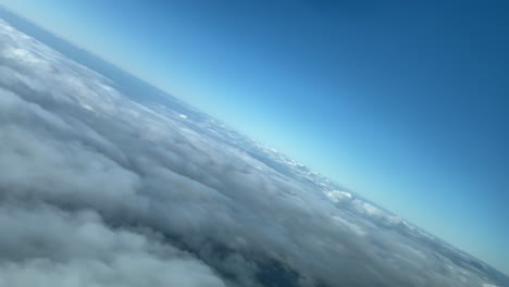 Flying-over-the-clouds-in-a-45-degree-banking-during-a-left-turn