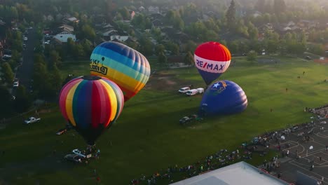 Hot-air-balloons-inflating-at-the-Balloons-Over-Bend-event-in-Bend,-Oregon