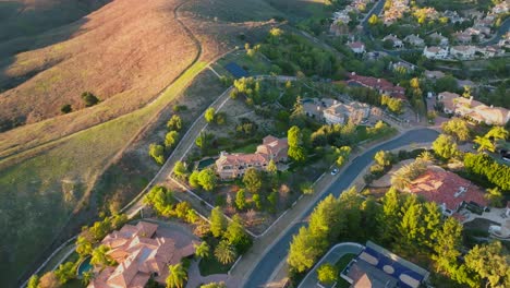 Aerial-Footage-over-Luxury-Community-Hidden-Hills,-in-Calabasas-California-on-a-sunny-day