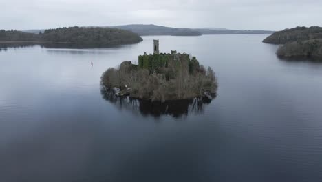 McDermott-Castle-on-an-island-in-Lough-Key,-Roscommon,-Ireland,-surrounded-by-calm-waters