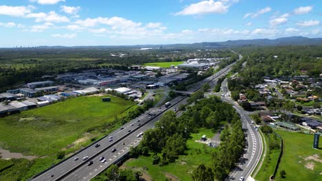 Aerial-view-of-an-industrial-area-on-a-sunny-day,-Worongary,-Gold-Coast