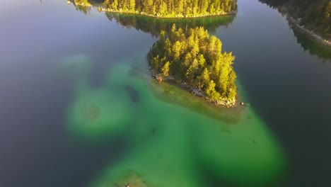 Opening-Shot-Lake-Eibsee-With-Turquoise-Water-And-Mountains-In-Background,-Aerial-Lake-Eibsee,-Germany