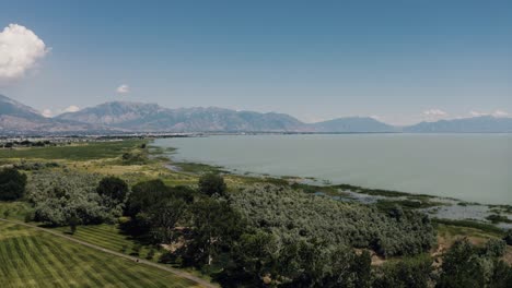 Aerial-shot-of-Utah-Lake's-shoreline-on-a-sunny-day