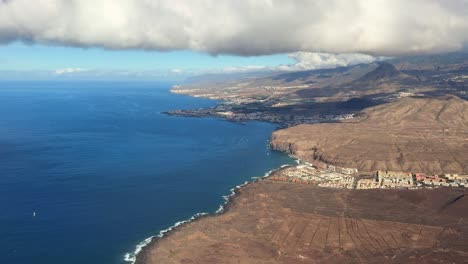 Tenerife-coast-view-from-plane-of-south-side-Los-Cristianos-from-above