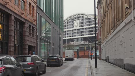 View-down-a-street-leading-to-Manchester-Central-Station-on-a-cloudy-day