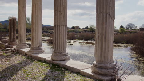 Sun-shining-through-pillars-of-the-Ionic-Stoa-in-the-Hellenistic-Gymnasium-in-Miletus