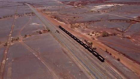 Old-Iron-Ore-Train-Parked-in-Zouérat,-Mauritania