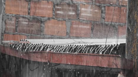 Heavy-rain-on-a-corrugated-steel-roof