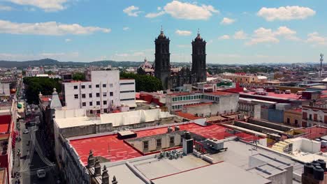 Aerial-of-Puebla-Cathedral-and-surrounding-buildings-on-sunny-day---Puebla-City,-Mexico